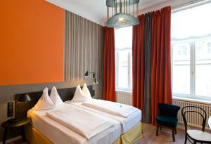 Una cama o camas en una habitación de Hotel Beethoven Wien