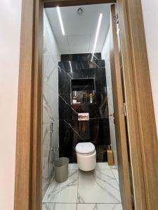 Ένα μπάνιο στο Vivez le luxe à Skikda Appartement haut de gamme à deux pas de la mer