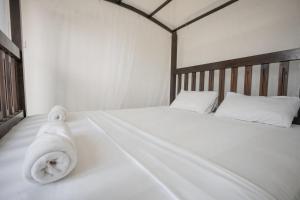เตียงในห้องที่ Why Not Hostel