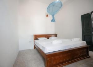 เตียงในห้องที่ Why Not Hostel
