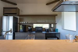 Køkken eller tekøkken på Dei Amami - Vacation STAY 28894v