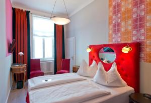 Una cama o camas en una habitación de Hotel Beethoven Wien