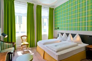 Una cama o camas en una habitación de Hotel Beethoven Wien