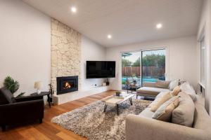 Et tv og/eller underholdning på The Break Pool Spa Sauna & Beach