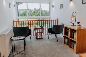 Χώρος καθιστικού στο Modern Comfort Escape for 12 Guests -Rural Setting