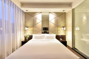 Imagen de la galería de Orange Hotel Beijing Yizhuang Wanyuan Street Subway Station, en Beijing