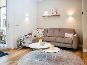 Χώρος καθιστικού στο Spacious holiday home in Voorhuizen with terrace