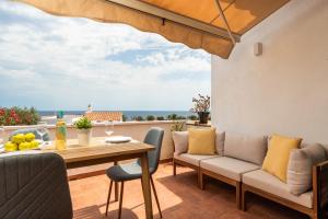 Posezení v ubytování Apartamento Felicidad + 12 fotografií