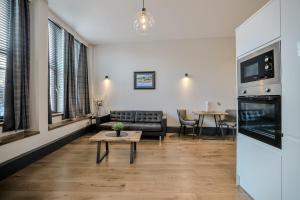 Kuchyň nebo kuchyňský kout v ubytování Campbell Street Apartments