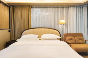 Zhangjiajie Rock language art hotel-Free pick up service客房内的一张或多张床位