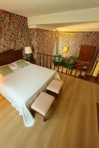 Postel nebo postele na pokoji v ubytování Resort Dei Limoni