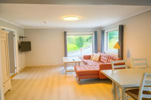 Телевизор и/или развлекательный центр в Byrkjedalstunet Hotell