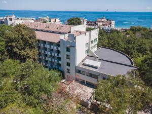 an aerial view of a building and the ocean at Hotel Zdravets in Varna City