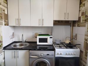 Afbeelding uit fotogalerij van Квартира in Taraz