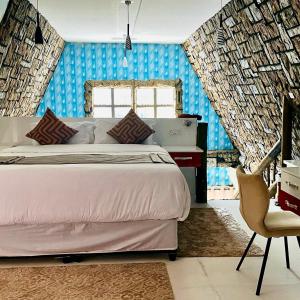 Postel nebo postele na pokoji v ubytování Rustiek Hotel + 37 fotografií