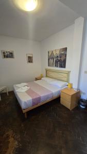 Ένα ή περισσότερα κρεβάτια σε δωμάτιο στο Cà Dolce Vita