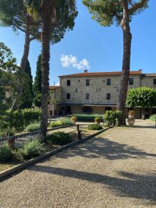 En have udenfor PoloTuristicoUmbria Residence al Lago con Piscina