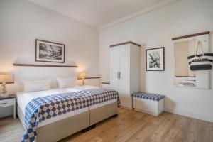 Postel nebo postele na pokoji v ubytování Hotel Strandschlösschen