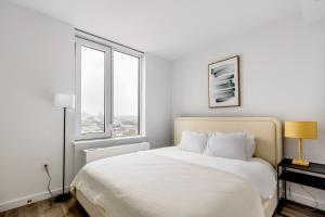 Postel nebo postele na pokoji v ubytování Blueground Gowanus washer nr Prospect Park NYC-1944