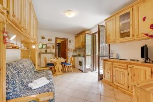 Η κουζίνα ή μικρή κουζίνα στο Relax In Pineta - Happy Rentals