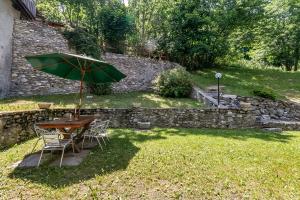 Zahrada ubytování Relax In Pineta - Happy Rentals + 16 fotografií