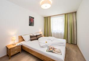 Posteľ alebo postele v izbe v ubytovaní Apartments Schmittental - Schmitten62 Self Check-In