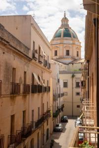 a view of a building with a dome on top at La Gorgonia in Trapani