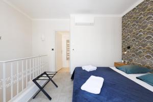 Кровать или кровати в номере Duplex Charmant et Central Cannes Forville