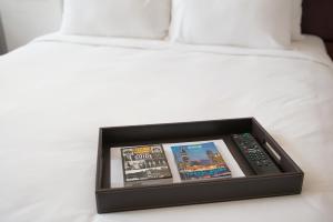 Voodi või voodid majutusasutuse Hanoi E Central Luxury Hotel & Restaurant toas