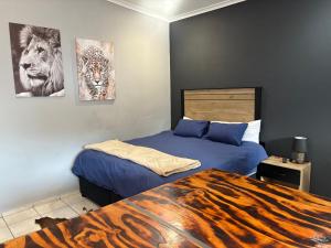 Ένα ή περισσότερα κρεβάτια σε δωμάτιο στο Be Still Haven