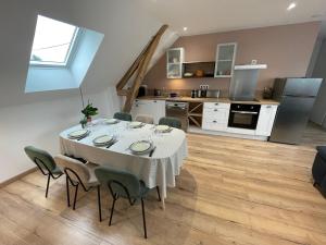 Η κουζίνα ή μικρή κουζίνα στο Appartements pour 8 personnes +8 φωτογραφίες