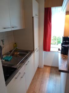 Kuchyň nebo kuchyňský kout v ubytování Ferienwohnung Kälberstall