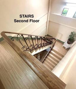 a view of a staircase with a second floor at Choltara home in Hat Yai