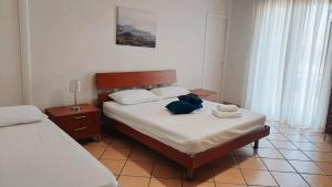 Ένα ή περισσότερα κρεβάτια σε δωμάτιο στο Casa Granata