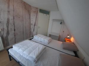 Ένα ή περισσότερα κρεβάτια σε δωμάτιο στο Luxuriöses Landhaus mit Hot Tub