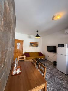 Kuchyň nebo kuchyňský kout v ubytování Apartamentos La Aldea Suites