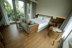 Postel nebo postele na pokoji v ubytování Wyndham Garden Jim Corbett Chhoi + 49 fotografií