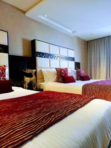 Postel nebo postele na pokoji v ubytování Samarons Hotels