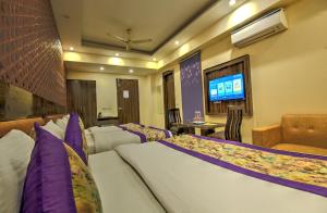 TV o dispositivi per l'intrattenimento presso Hotel Smart Lax