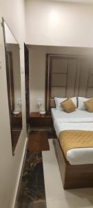 Postel nebo postele na pokoji v ubytování Hotel Nordijan