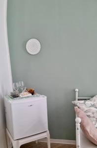 a bedroom with a white dresser next to a bed at ALLE TERRAZZE di Castellana Grotte in Castellana Grotte +44 photos