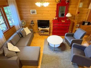 Posezení v ubytování Holiday Home Tyynelä by Interhome