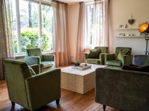 Χώρος καθιστικού στο Holiday Home Douglas by Interhome