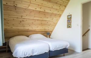 Ένα ή περισσότερα κρεβάτια σε δωμάτιο στο V-61 Klein Axel