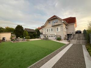 Κήπος έξω από το Tocc Apartman