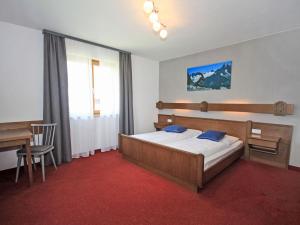 Ένα ή περισσότερα κρεβάτια σε δωμάτιο στο Holiday Home Chalet Alpin-2 by Interhome +19 φωτογραφίες