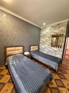 Tatev Inn Shinuhayr客房内的一张或多张床位