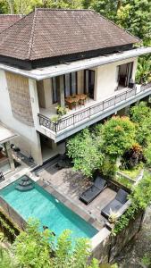 an aerial view of a house with a swimming pool at Ubud Harmony Private Villa and Pool in Ubud