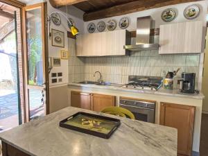 Kuchyň nebo kuchyňský kout v ubytování Holiday Home Alle Piane by Interhome + 41 fotografií
