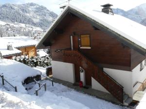 Chalet Loupnots 2P avec vue v zimě